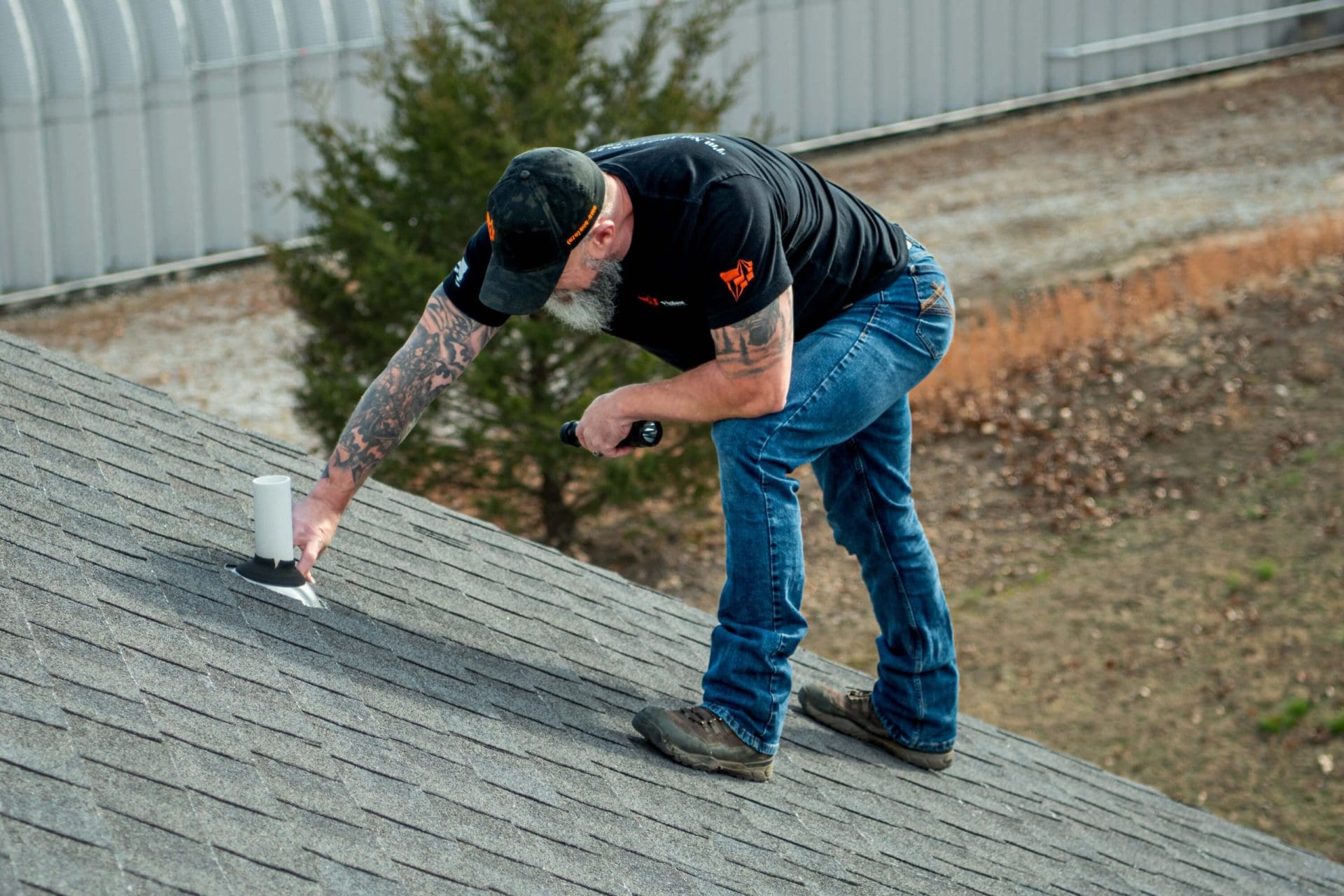 home inspector Aaron Anderson doing roof inspection services